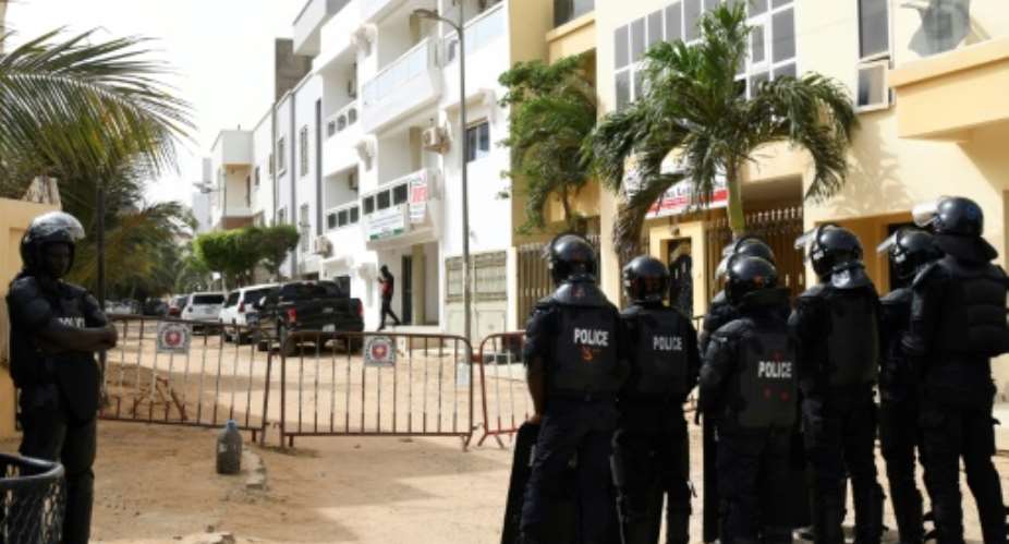 Police closed off the street leading to Senegal opposition leader Ousmane Sonko's home in Dakar on June 17, 2022.  By SEYLLOU AFP