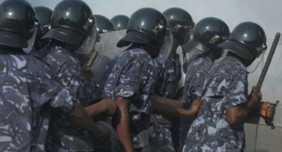 Police fired tear gas at hundreds of people Saturday as they marched through Togo's capital to protest the shutdown of two private media channels.  By ISSOUF SANOGO AFPFile