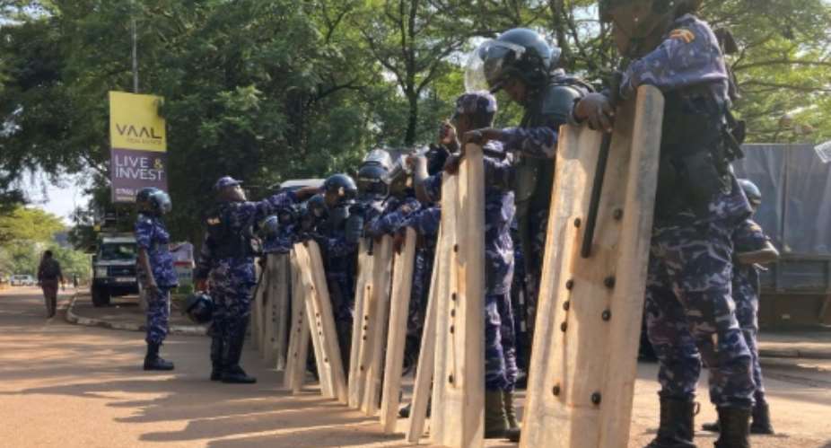 Police in anti-riot gear were out in force.  By Badru KATUMBA (AFP)