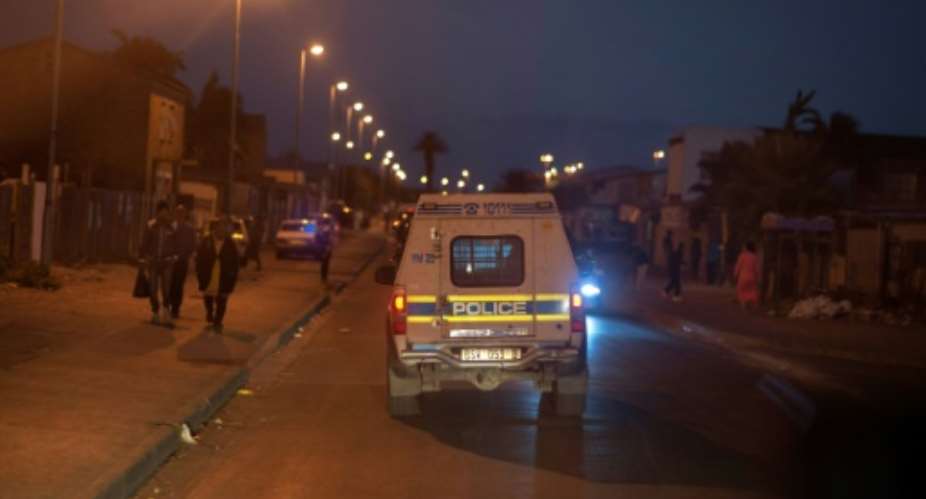 Police vehicles will escort emergency vehicles in Johannesburg between 10:00 pm and 6:00 am in areas identified as hotspots.  By RODGER BOSCH AFPFile