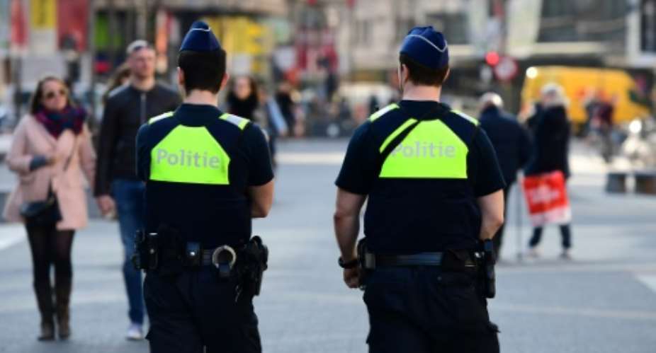 Policemen patrol in the Belgian city of Antwerp on March 23, 2017.  By EMMANUEL DUNAND AFP