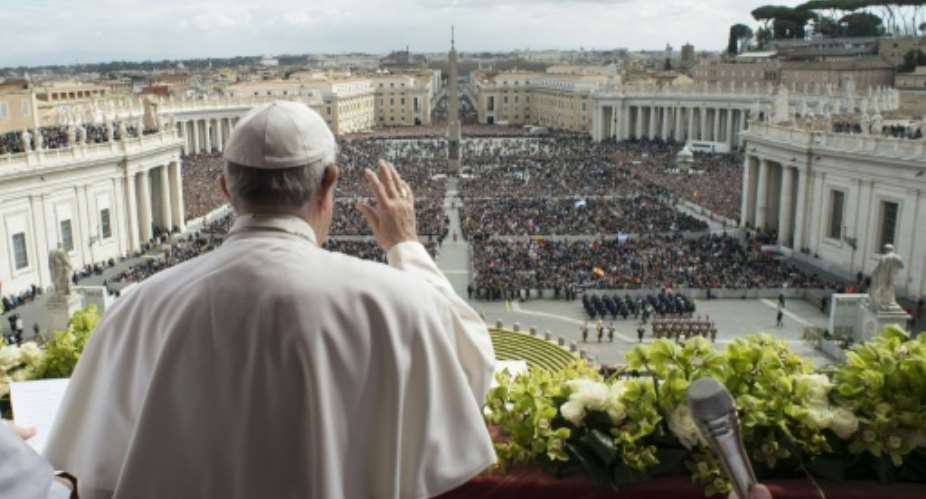 Pope Francis delivers the Urbi et Orbi blessing to 80,000 pilgrims in St Peter's Square, as well as the millions watching the broadcast around the world.  By HO VATICAN MEDIAAFP