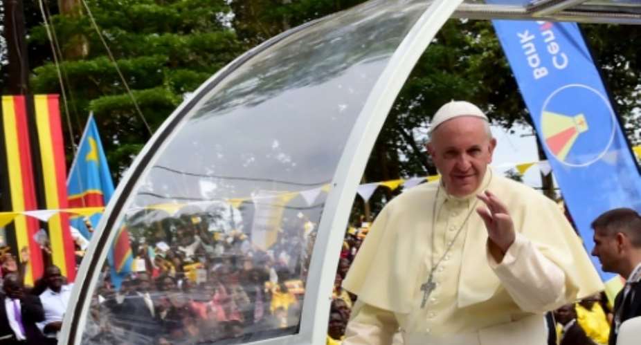 Pope Francis received a rapturous welcome as he arrived at a shrine to the martyrs at Namugongo, just outside the capital Kampala.  By Giuseppe Cacace AFP