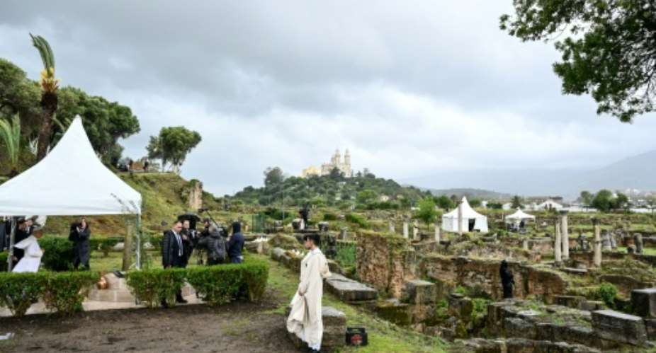 Pope Leo prays during a visit to the archaeological site of Hippo in Annaba.  By Alberto PIZZOLI (AFP)
