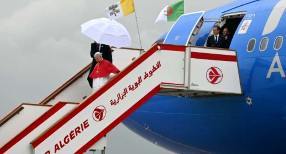 Pope Leo XIV arriving in Algiers.  By Alberto PIZZOLI (AFP)