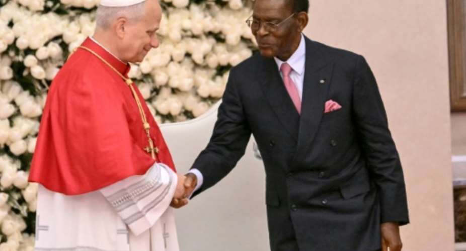 Pope Leo XIV was met by Equatorial Guineas President Teodoro Obiang Nguema Mbasogo.  By Alberto PIZZOLI (AFP)