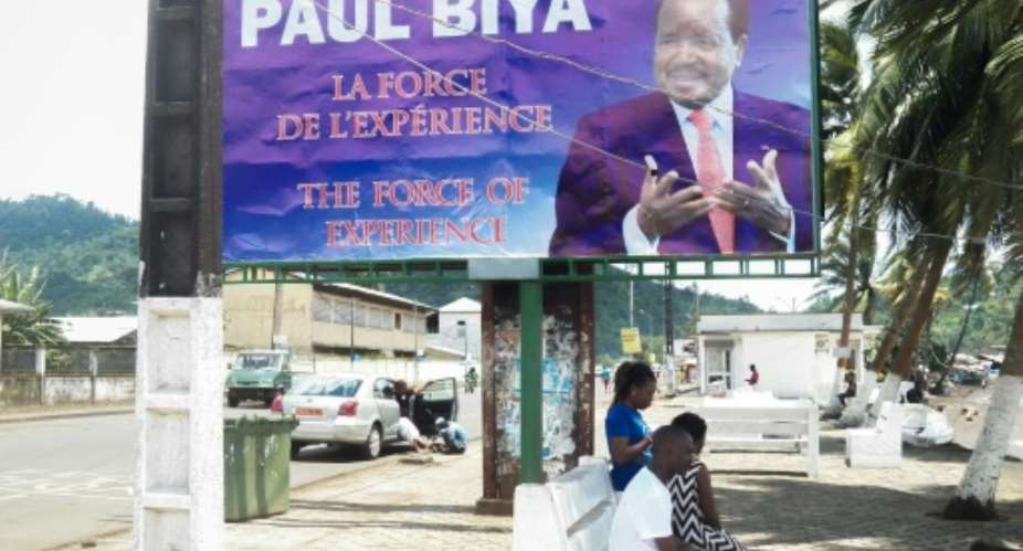 Posters tout Biya as a time tested leader.  By STRINGER AFPFile