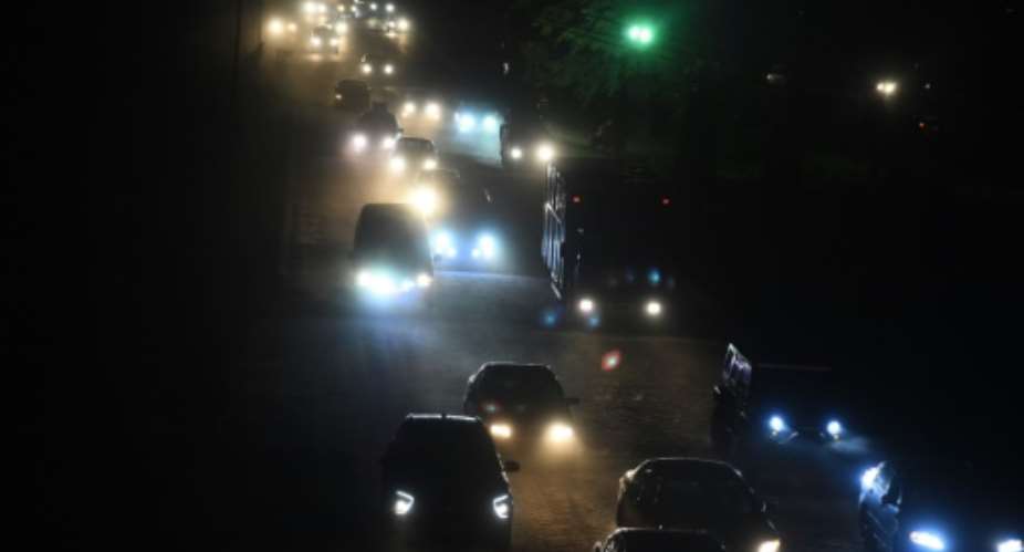 Power outages are common in Nigeria, Africas most populous country, where 220 million people depend on a saturated network for their electricity needs.  By PIUS UTOMI EKPEI (AFP/File)