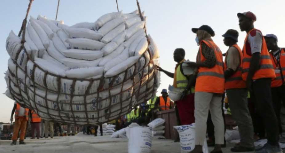 Precious cargo: A consignment of imported rice lands on Monday in Moroni.  By Ibrahim YOUSSOUF AFP