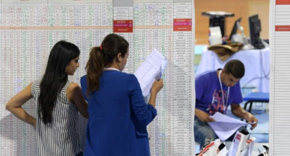 Preliminary official results of Tunisia's legislative elections are expected on Wednesday.  By FETHI BELAID AFP