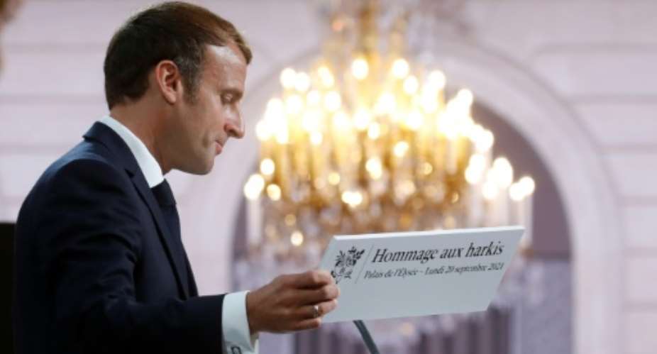 President Emmanuel Macron last month asked for forgiveness from the families of Algerians who fought alongside the French in Algeria.  By GONZALO FUENTES POOLAFPFile