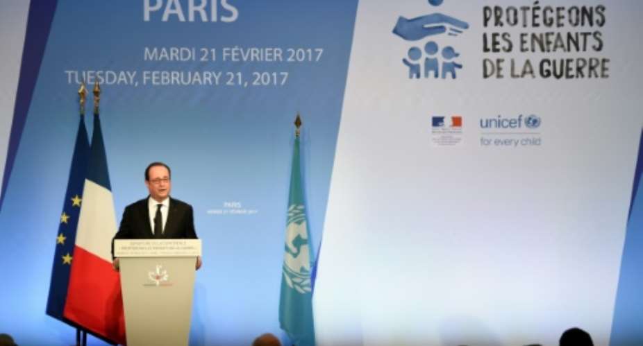 President Francois Hollande chides Britain over underaged migrants stuck in France with family in the UK.  By STEPHANE DE SAKUTIN AFP