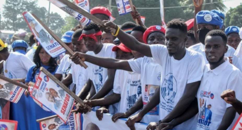President George Weah, a former footballing icon, wants to cut the length of terms for presidents and lower-house lawmakers..  By Zoom DOSSO (AFP)