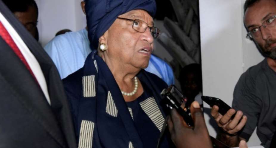 President of Liberia Ellen Johnson Sirleaf led a heavyweight delegation to The Gambia to seek to broker a deal, meeting both Jammeh and Barrow.  By Seyllou AFPFile