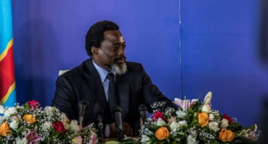 President of the Democratic Republic of Congo, Joseph Kabila, seen here holding a press conference for the first time in five years on January 26, 2018 in Kinshasa, refused to leave office when his term expired in December 2016.  By THOMAS NICOLON AFPFile