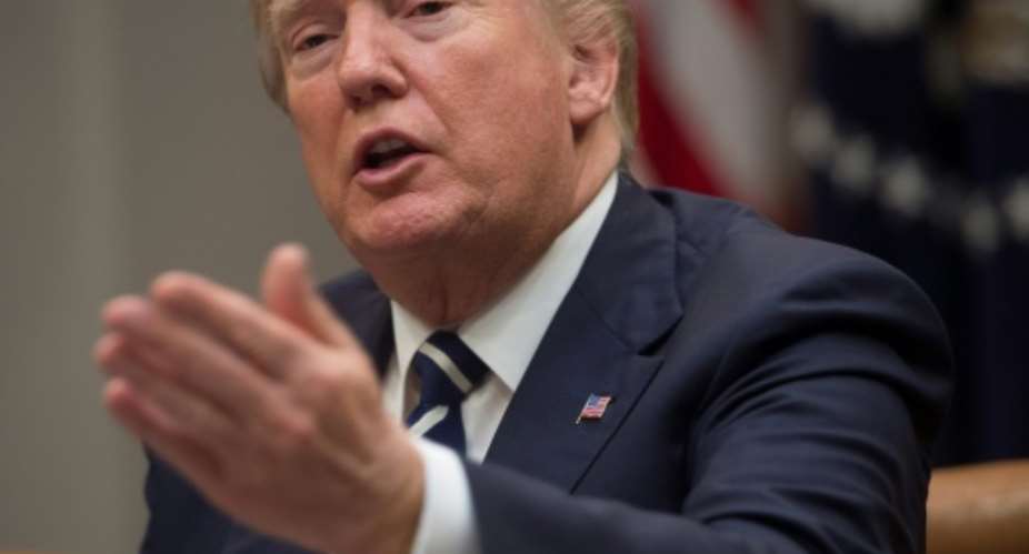 President Trump lashed out at immigrants from certain countries, using profanity, several newspapers report.  By SAUL LOEB AFP