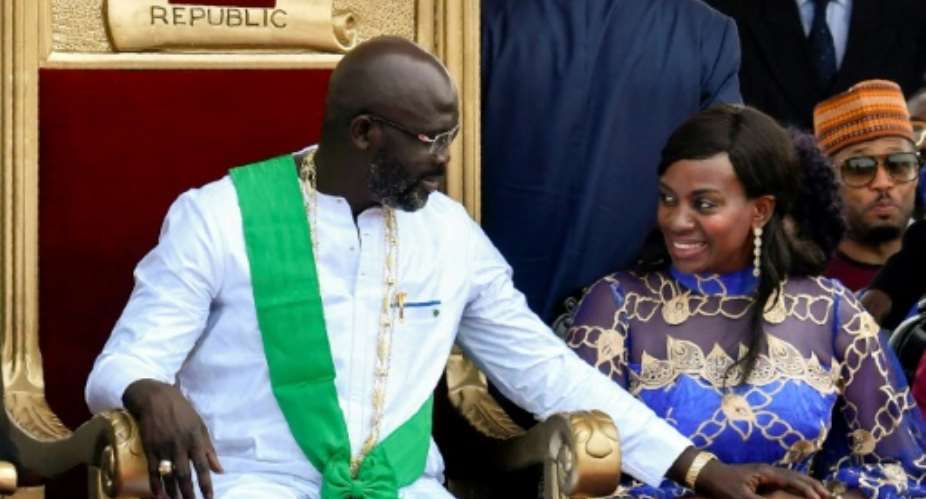 President Weah and his wife Clar, pictured at his inauguration in January 2018.  By ISSOUF SANOGO AFP
