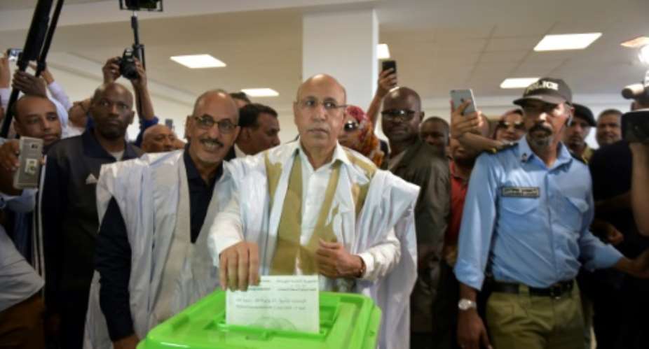 Presidential candidate Mohamed Ould Ghazouani C officially won the disputed Mauritanian election.  By SIA KAMBOU AFP