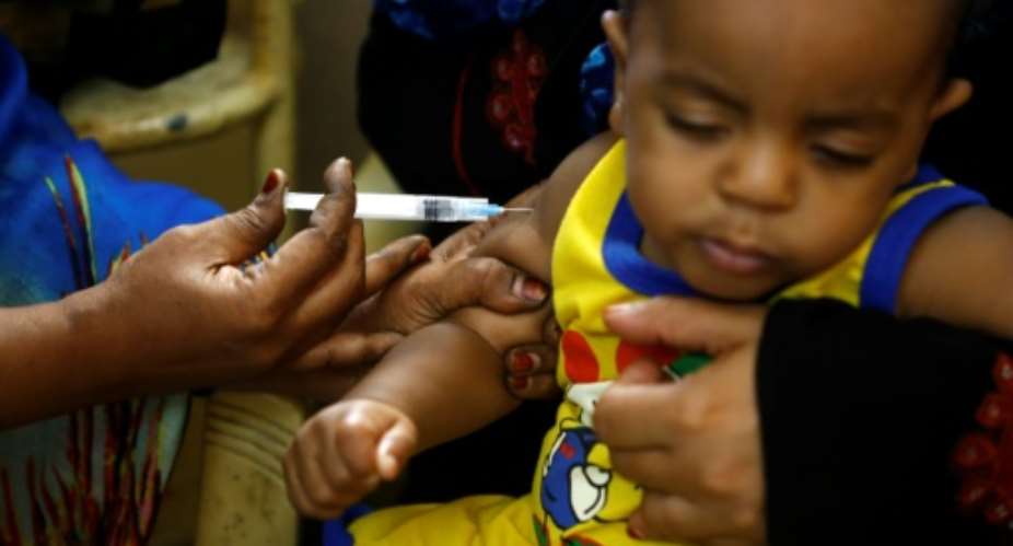 Preventing epidemics of measles requires 95 percent of the population to be immunised, says DR Congo's health minister.  By ASHRAF SHAZLY AFP