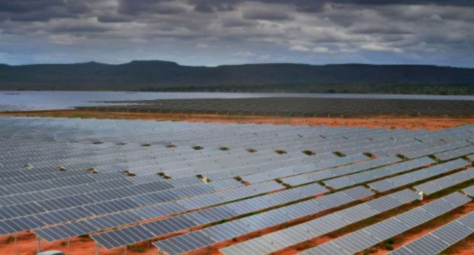 Previous studies have found that wind and solar farms, such as this one in Brazil can introduce significant changes in climate at the continental scale by creating rougher, darker land surfaces.  By CARL DE SOUZA AFPFile