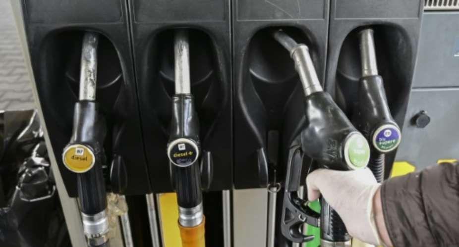 Prices at the pump didn't go negative last year.  By MIGUEL MEDINA AFPFile