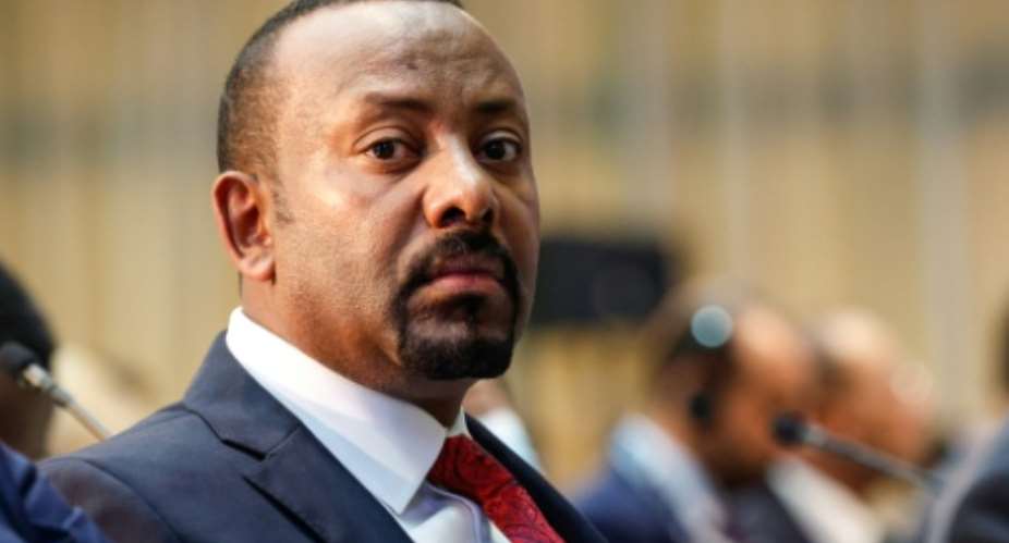 Prime Minister Abiy Ahmed began his rule in 2018 with popular reforms.  By SIMON MAINA (AFP)
