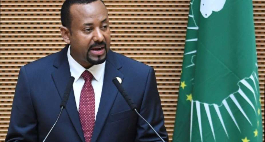 Prime Minister Abiy Ahmed has embarked on economic reforms and allowed dissident groups back into the country but has also battled a surge in tensions between ethnic groups.  By Monirul BHUIYAN AFPFile
