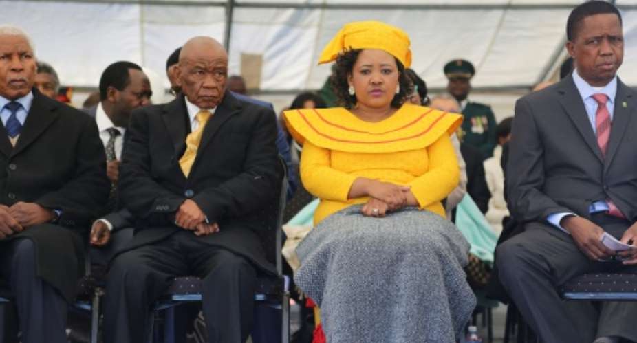 Prime Minister Thomas Thabane and Maesaiah Thabane, pictured alongside Zambian President Edgar Lungu, right, at Thabane's inauguration, two days after the murder of the premier's estranged wife.  By SAMSON MOTIKOE AFPFile
