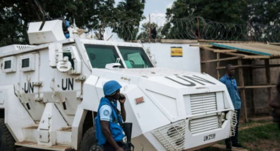 Protection: A MONUSCO armoured vehicle guarding the Ebola response headquarters in the violence-torn eastern city of Beni.  By ALEXIS HUGUET AFP