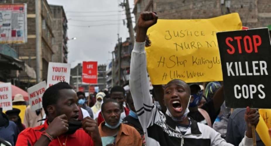 Protest: Residents of Mathare demonstrate against police violence.  By TONY KARUMBA AFP
