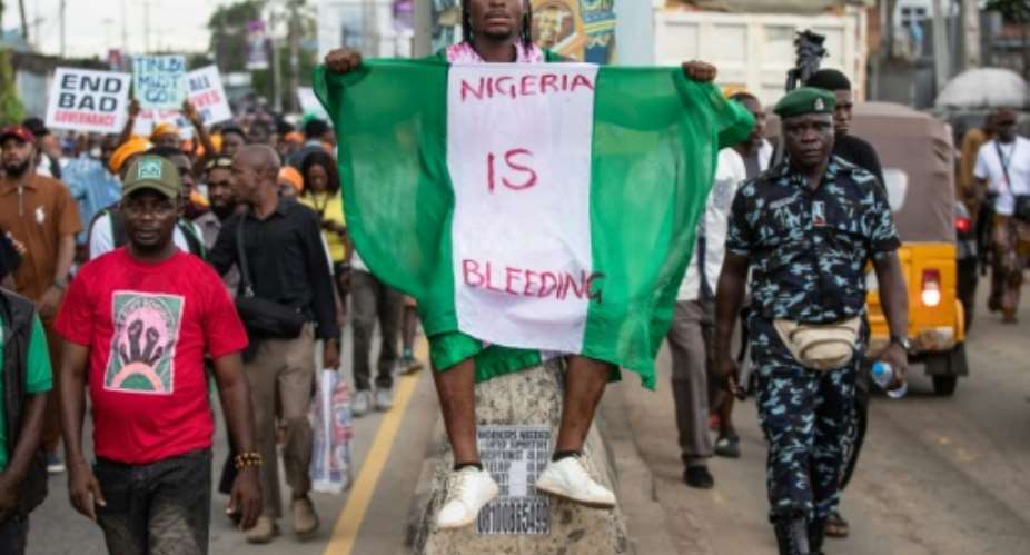 Protesters also marched in the streets of Lagos.  By TOYIN ADEDOKUN (AFP)