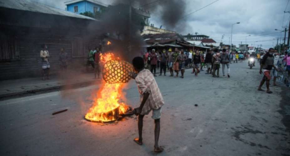 Protesters burned tyres, blocked roads and threw stones at security forces.  By RIJASOLO AFP