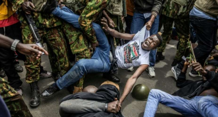 Protesters in the Kenyan capital were arrested outside the parliament building.  By Luis TATO (AFP)