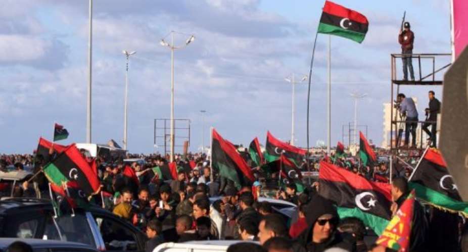 Libyans celebrate the second anniversary of the uprising against Kadhafi, on February 17, 2013, in Benghazi.  By Abdullah Doma AFPFile