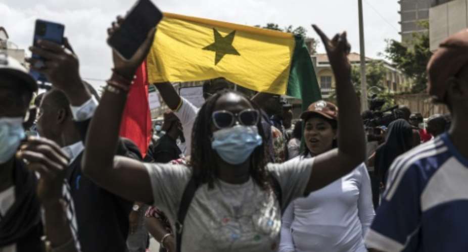Protesters, mostly from the Alliance for the Republic (APR), the party of former president Macky Sall, gathered outside the National Assembly.  By PATRICK MEINHARDT (AFP)