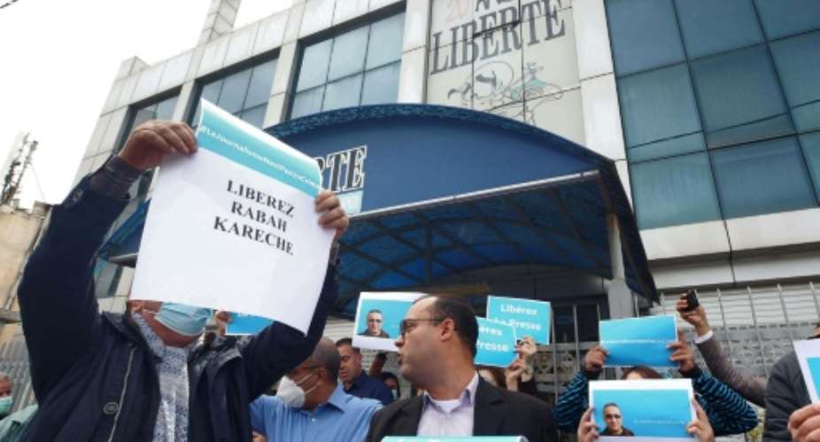 Protesters outside the headquarters of French-language newspaper 'Liberte' in April.  By - AFPFile