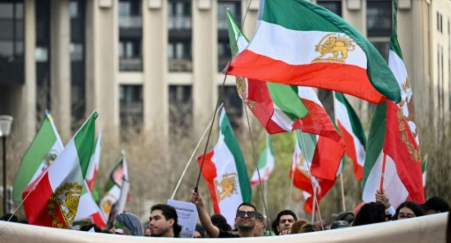 Protesters supporting the son of Irans late shah gathered in Paris.  By Lou BENOIST (AFP)