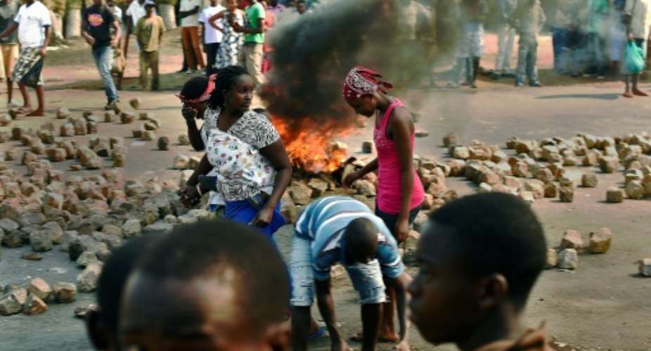 Protests erupted in Burundi in 2015 over President Pierre Nkurunziza's decision to bid for a third straight  term. During the ensuring crackdown, more than 1,200 people were killed and 400,000 fled the country.  By CARL DE SOUZA AFP
