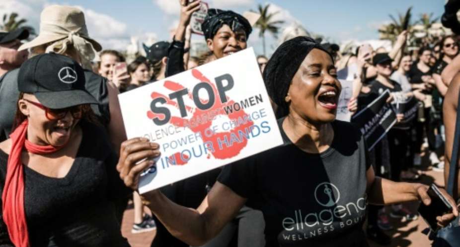 Protests last year spurred South Africa to wake up to the domestic violence -- a crisis that is being worsened by coronavirus lockdown.  By Rajesh JANTILAL AFP