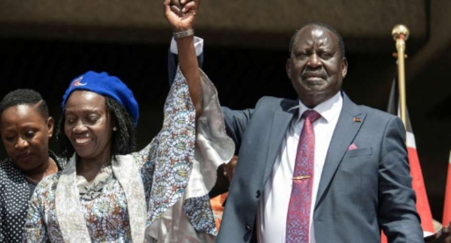 Raila Odinga with his chosen running mate Martha Karua.  By Tony KARUMBA AFP