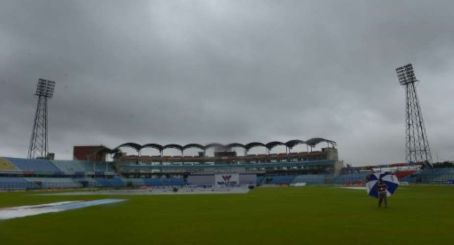 Rain falls during the final day of the first Test match between Bangladesh and South Africa at the Zahur Ahmed Chowdhury Stadium in Chittagong on July 25, 2015.  By Munir Uz Zaman AFP