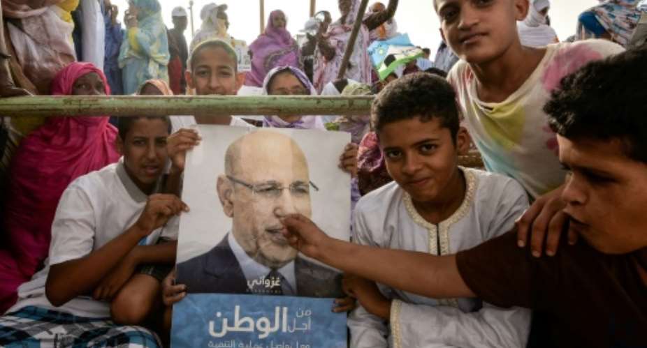 Rally: Supporters of Mohamed Ould Ghazouani, the frontrunner in Saturday's presidential race.  By Sia KAMBOU AFP