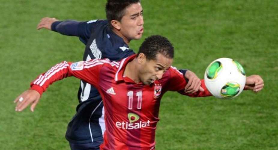 Al Ahly forward Walid Soliman (front R) fights for the ball during the Club World Cup in Yokohama on December 16, 2012.  By Toru Yamanaka (AFP/File)