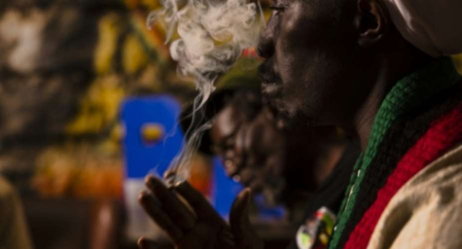 Rastafarians use marijuana as part of their religious meditation.  By Tony KARUMBA (AFP)