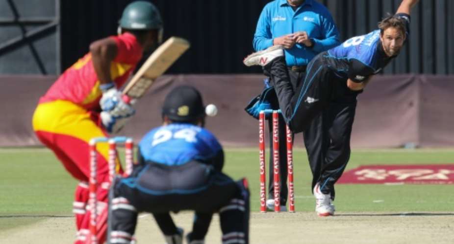 New Zealand bowler Grant Elliot plays a shot during the second game in a series of three One Day International ODI cricket matches between Zimbabwe and New Zealand at Harare Sports Club on August 4, 2015.  By Jekesai Njikizana AFP