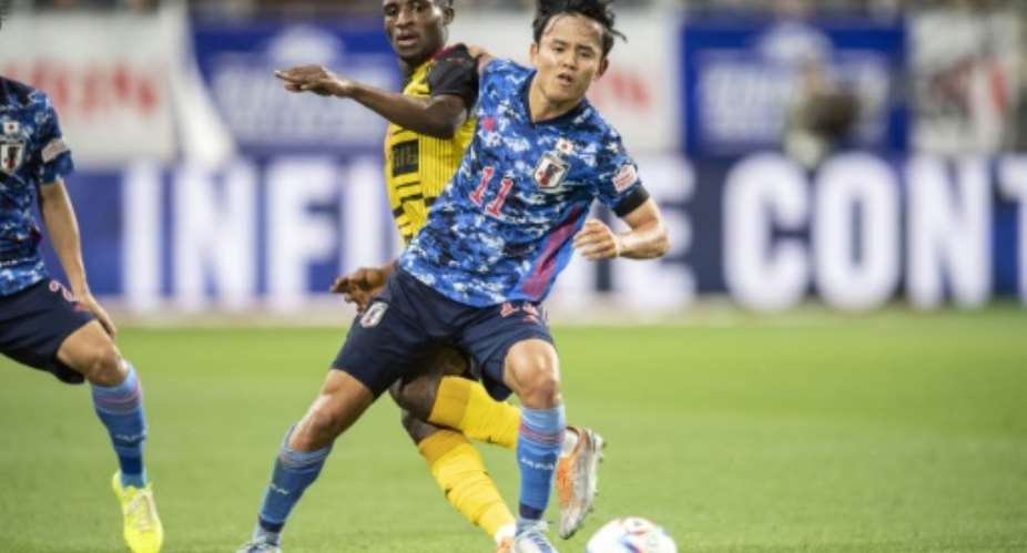 Real Madrid starlet Takefusa Kubo scored his first international goal as Japan thrashed Ghana 4-1 to step up their World Cup preparations.  By Charly TRIBALLEAU AFP