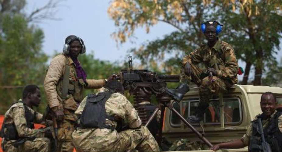 South Sudanese People Liberation Army SPLA soldiers patrol in Malakal on January 21, 2014.  By Harrison Ngethi AFP