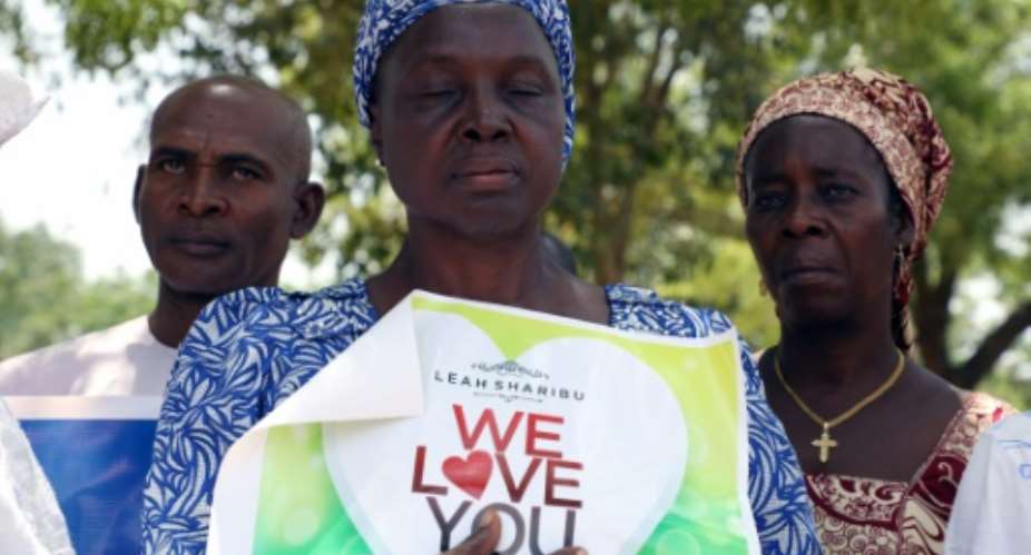 Relatives and activists mark the 16th birthday of Leah Sharibu, abducted by Boko Haram Islamists in Nigeria on February 19, 2018.  By KOLA SULAIMON AFP