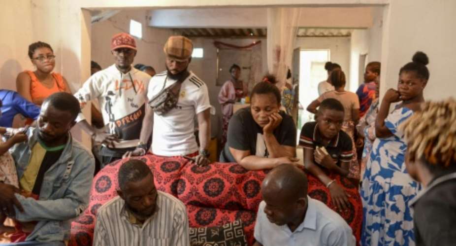 Relatives and friends of Silvia Mubiala mourn after she was allegedly shot by security forces during the unrest in the Angolan capital Luanda.  By - (AFP)