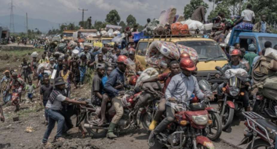 Residents flee fighting near Sake in eastern Democratic Republic of Congo on Wednesday.  By Aubin Mukoni AFP